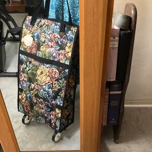 Foldable compact rolling storage bag.